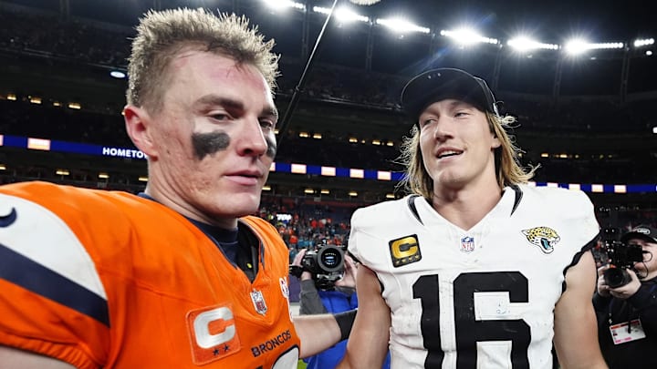 Dec 21, 2025; Denver, Colorado, USA; Denver Broncos quarterback Bo Nix (10) and Jacksonville Jaguars quarterback Trevor Lawrence (16) meet after the game at Empower Field at Mile High.