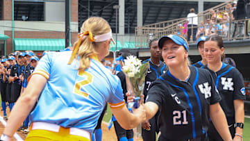 Tennessee softball seniors give Kentucky seniors flowers before the game against Kentucky at Sherri Parker Lee Stadium in Knoxville, TN on May 4, 2024.