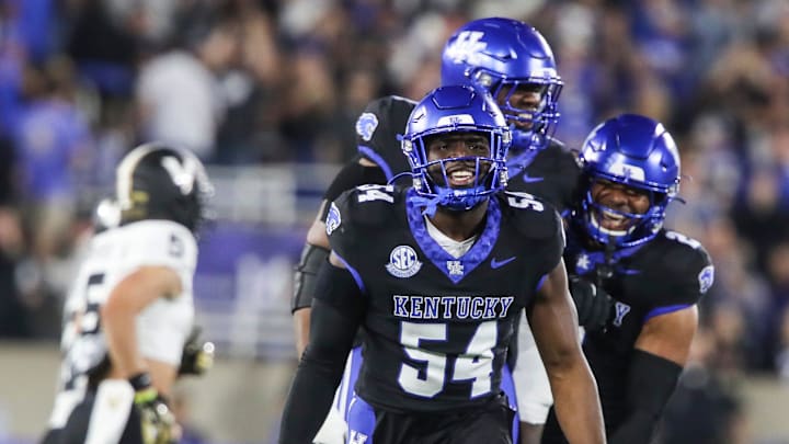 Linebacker D'Eryk Jackson (54) of the Kentucky Wildcats celebrates after making an interception against Vanderbilt in the first half. The Commodores defeated the Wildcats 20-13 at Kroger Field Saturday, Oct. 12, 2024 in Lexington, Ky.