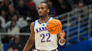 Nov 3, 2025; Lawrence, Kansas, USA; Kansas Jayhawks guard Darryn Peterson (22) dribbles during the second half against the Green Bay Phoenix at Allen Fieldhouse. Mandatory Credit: Jay Biggerstaff-Imagn Images