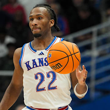Nov 3, 2025; Lawrence, Kansas, USA; Kansas Jayhawks guard Darryn Peterson (22) dribbles during the second half against the Green Bay Phoenix at Allen Fieldhouse. Mandatory Credit: Jay Biggerstaff-Imagn Images