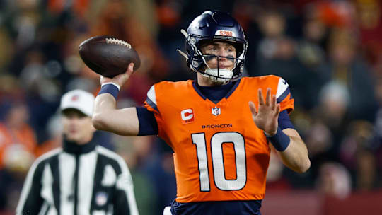 Nov 30, 2025; Landover, Maryland, USA; Denver Broncos quarterback Bo Nix (10) passes the ball against the Washington Commanders in the second quarter of the game at Northwest Stadium. Mandatory Credit: Peter Casey-Imagn Images