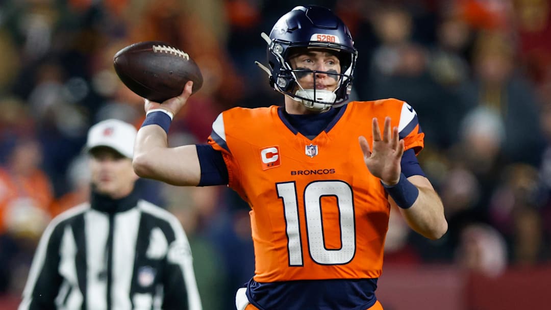 Nov 30, 2025; Landover, Maryland, USA; Denver Broncos quarterback Bo Nix (10) passes the ball against the Washington Commanders in the second quarter of the game at Northwest Stadium. 