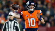 Nov 30, 2025; Landover, Maryland, USA; Denver Broncos quarterback Bo Nix (10) passes the ball against the Washington Commanders in the second quarter of the game at Northwest Stadium. 