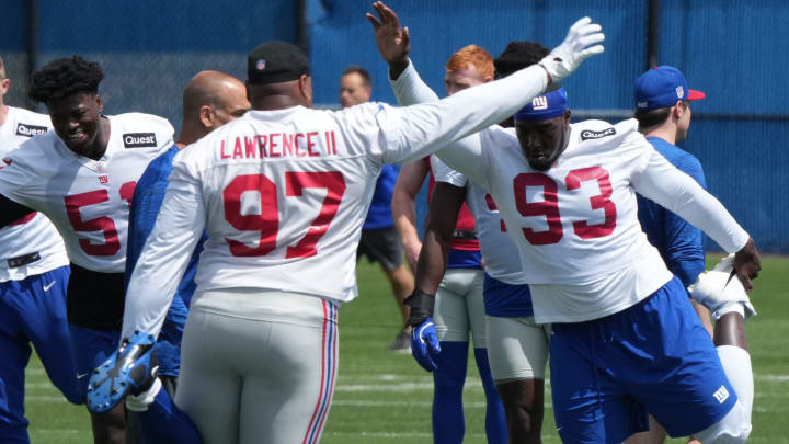 East Rutherford, NJ -- June 11, 2024 -- Defensive linemen Dexter Lawrence II and Raheem Nunez-Roches at the NY Giants Mandatory Minicamp at their practice facility in East Rutherford, NJ.