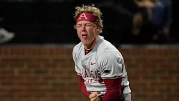 Arkansas left fielder Charles Davalan (24) reacts after he safely reached home against Vanderbilt on a double hit by Kuhio Aloy during the ninth inning at Hawkins Field in Nashville, Tenn., Friday, March 28, 2025.