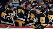 Nov 30, 2024; Pittsburgh, Pennsylvania, USA;  Pittsburgh Penguins right wing Rickard Rakell (67) celebrates his goal with the Penguins bench against the Calgary Flames during the third period at PPG Paints Arena. Mandatory Credit: Charles LeClaire-Imagn Images