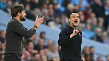 Russell Martin and Pep Guardiola on the touchline 