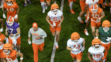 Clemson head coach Dabo Swinney and the team run from indoors to outside during the first football practice at the Allen N. Reeves Football Complex at Clemson University in Clemson, S.C. Friday, February 28, 2025.