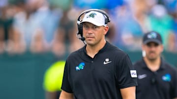 Aug 30, 2025; New Orleans, Louisiana, USA; Tulane Green Wave head coach Jon Sumrall looks on against Northwestern Wildcats during the first half at Yulman Stadium. Mandatory Credit: Stephen Lew-Imagn Images