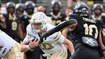 Sep 27, 2025; Winston-Salem, North Carolina, USA;  Georgia Tech Yellow Jackets quarterback Haynes King (10) runs the ball during the fourth quarter against the Wake Forest Demon Deacons at Allegacy Federal Credit Union Stadium. Mandatory Credit: Zachary Taft-Imagn Images