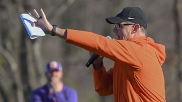 Clemson defensive coordinator Tom Allen communicates with players through a loudspeaker during the first football practice at the Allen N. Reeves Football Complex at Clemson University in Clemson, S.C. Friday, February 28, 2025.