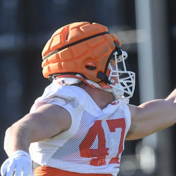 Clemson linebacker Sammy Brown (47) catches a ball in a drill during the first football practice at the Allen N. Reeves Football Complex at Clemson University in Clemson, S.C. Friday, February 28, 2025.