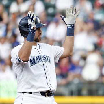 Seattle Mariners catcher Cal Raleigh (29) reacts towards the dugout after hitting a two-run double against the Boston Red Sox during the fourth inning at T-Mobile Park on June 17.