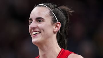 Sep 11, 2024; Indianapolis, Indiana, USA; Indiana Fever guard Caitlin Clark (22) smiles Wednesday, Sept. 11, 2024, during a game between the Indiana Fever and the Las Vegas Aces at Gainbridge Fieldhouse in Indianapolis.  Mandatory Credit: Grace Smith