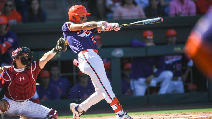 Clemson outfielder Cam Cannarella (10) hits against South Carolina sophomore Jake McCoy (23) during the top of the first inning of the Reedy River Rivalry at Fluor Field in Greenville, S.C. Saturday, March 1, 2025.