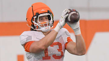 Clemson defensive end Will Heldt (13) catches a ball during the football practice at the Allen N. Reeves Football Complex at Clemson University in Clemson, S.C. Wednesday, March 5, 2025.