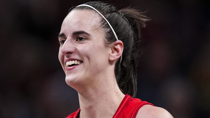 Indiana Fever guard Caitlin Clark (22) smiles Wednesday, Sept. 11, 2024, during a game between the Indiana Fever and the Las Vegas Aces.