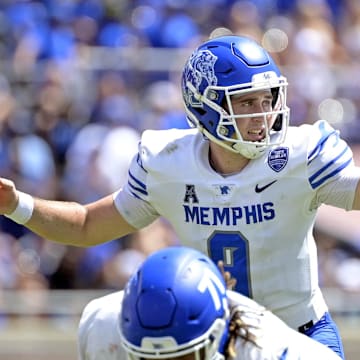 Sep 14, 2024; Tallahassee, Florida, USA; Memphis Tigers quarterback Seth Henigan (9) audibles at the line of scrimmage against the Florida State Seminoles during the first half at Doak S. Campbell Stadium. Mandatory Credit: Melina Myers-Imagn Images