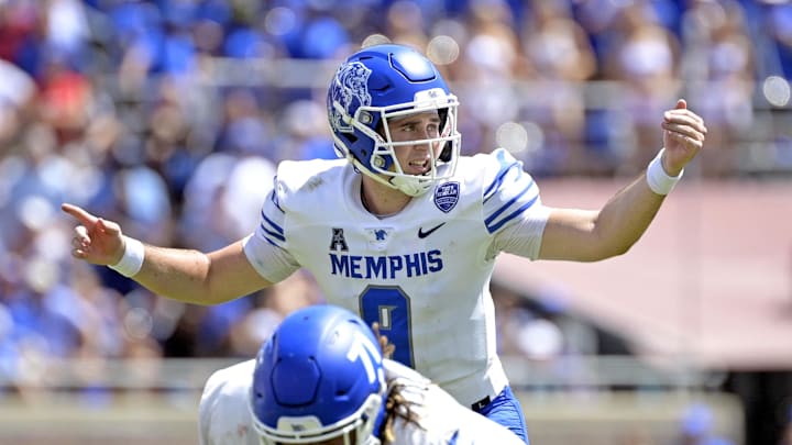 Sep 14, 2024; Tallahassee, Florida, USA; Memphis Tigers quarterback Seth Henigan (9) audibles at the line of scrimmage against the Florida State Seminoles during the first half at Doak S. Campbell Stadium. Mandatory Credit: Melina Myers-Imagn Images