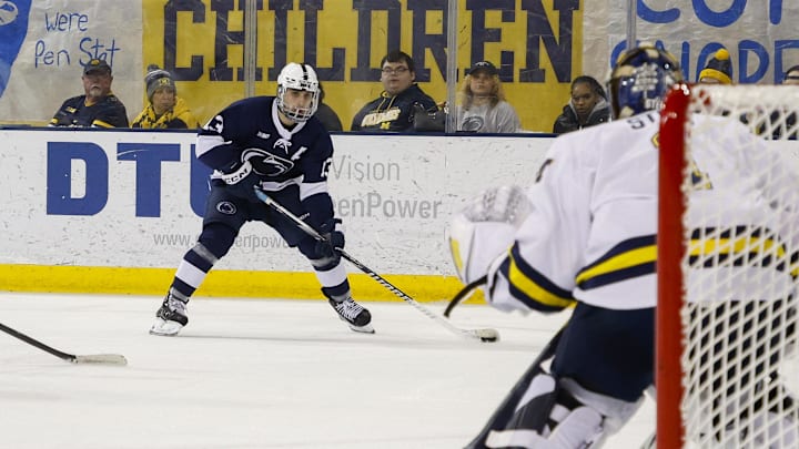 March 8, 2025; Ann Arbor, Michigan, USA; Penn State forward Danny Dzhaniyev (13) handles the puck during the second period against the Michigan Wolverines at Yost Ice Arena. Mandatory Credit: Brian Bradshaw Sevald-Imagn Images March 8, 2025; Ann Arbor, Michigan, USA; Penn State forward Danny Dzhaniyev (13) handles the puck during the second period against the Michigan Wolverines at Yost Ice Arena. Mandatory Credit: Brian Bradshaw Sevald-Imagn Images