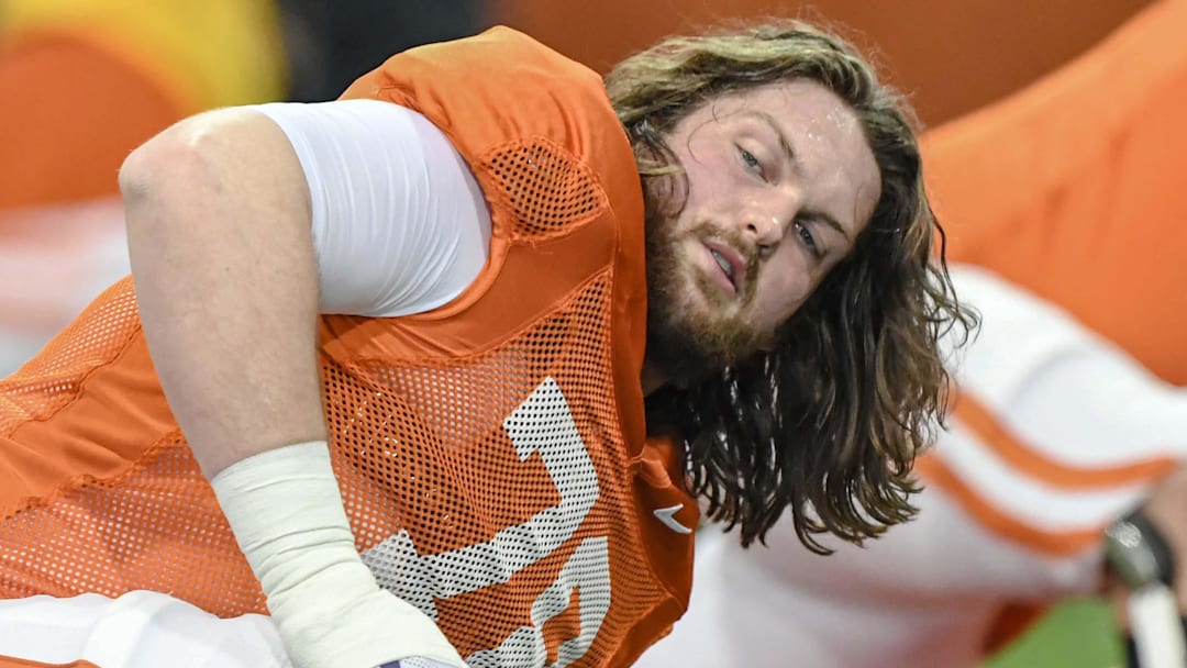 Clemson offensive lineman Blake Miller (78) stretches during the football practice at the Allen N. Reeves Football Complex at Clemson University in Clemson, S.C. Monday, March 3, 2025.