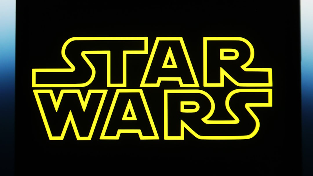 UKRAINE - 2023/05/13: In this photo illustration, a Star Wars logo is seen on a smartphone screen. 