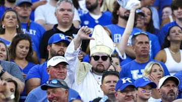 Sep 14, 2024; Lexington, Kentucky, USA; A Kentucky Wildcats fan dressed as a pope raises a thumbs down during the first half against Georgia Bulldogs at Kroger Field. Georgia won 13-12. Mandatory Credit: Carter Skaggs-Imagn Images