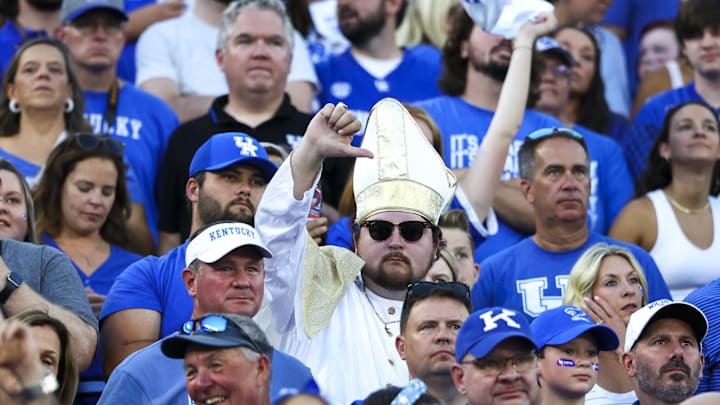 Sep 14, 2024; Lexington, Kentucky, USA; A Kentucky Wildcats fan dressed as a pope raises a thumbs down during the first half against Georgia Bulldogs at Kroger Field. Georgia won 13-12. Mandatory Credit: Carter Skaggs-Imagn Images