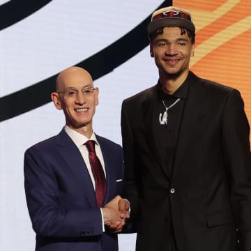 Kel'el Ware with NBA commissioner Adam Silver after being selected in the first round by the Miami Heat in the 2024 NBA Draft.