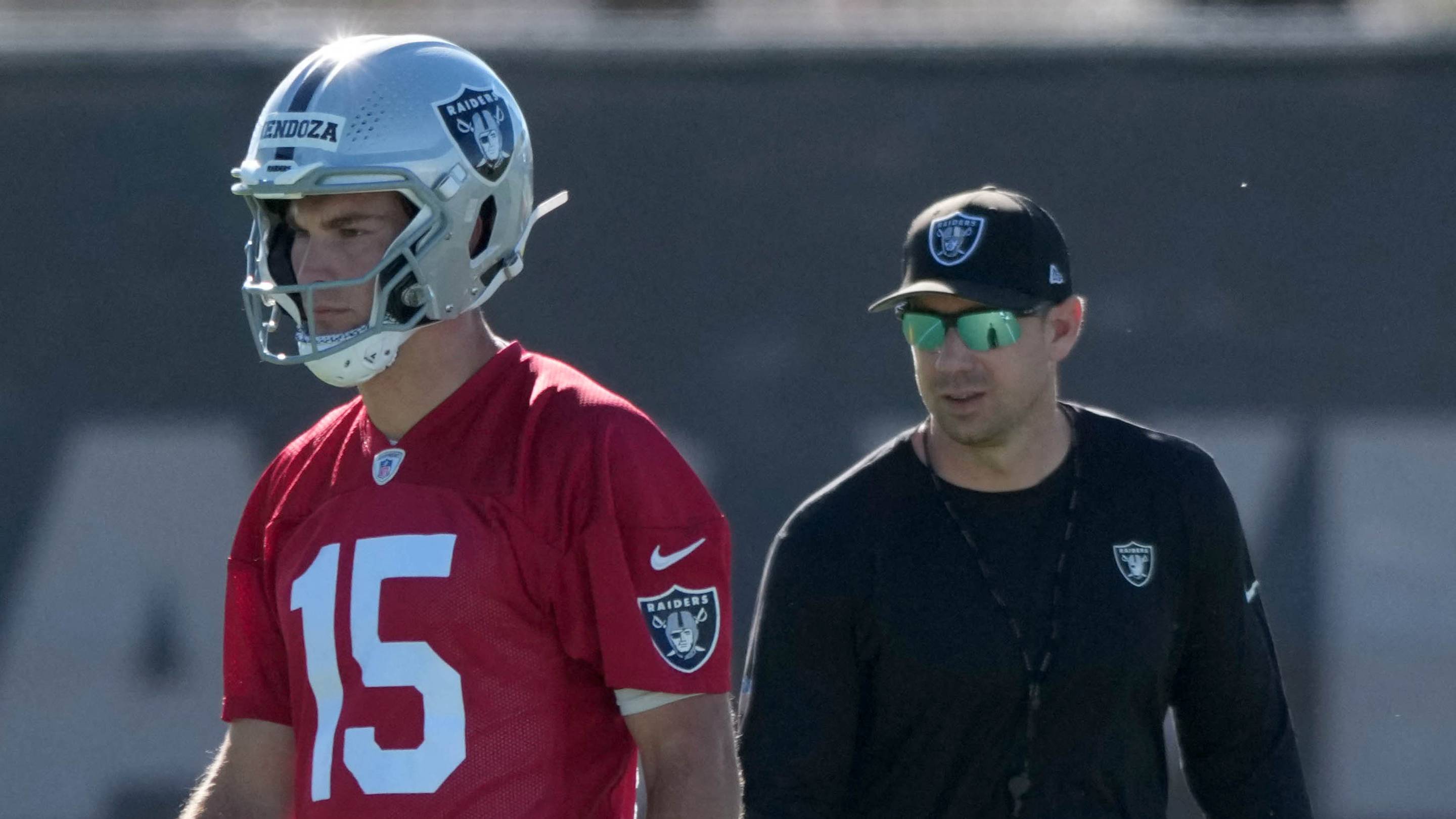 Jun 9, 2026; Henderson, NV, USA; Las Vegas Raiders quarterback Fernando Mendoza (15) and coach Klint Kubiak during minicamp at Intermountain Health Performance Center. Mandatory Credit: Kirby Lee-Imagn Images