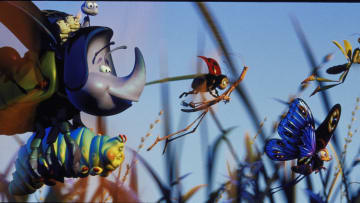 A BUG'S LIFE -- A colorful troupe of unemployed bug performers from a second-rate flea circus make an impressive entrance on Ant Island with their new pal, Flik (upper left atop Dim, the rhino beetle), in Disney/Pixar's, "A Bug's Life," the exciting computer-animated adventure from the creators of "Toy Story." A Walt Disney Pictures presentation of a Pixar Animation Studios film, "A Bug's Life" airs as a presentation of "The Wonderful World of Disney" on FRIDAY, FEBRUARY 16 (8:00 - 11:00 p.m.,