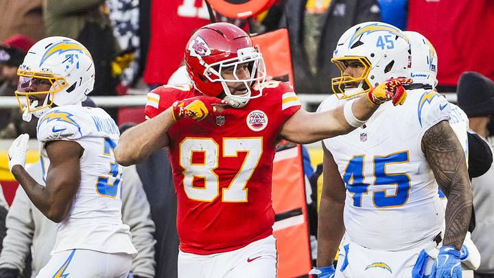 Dec 14, 2025; Kansas City, Missouri, USA; Kansas City Chiefs tight end Travis Kelce (87) celebrates a first down against the Los Angeles Chargers during the fourth quarter at GEHA Field at Arrowhead Stadium. Mandatory Credit: Denny Medley-Imagn Images