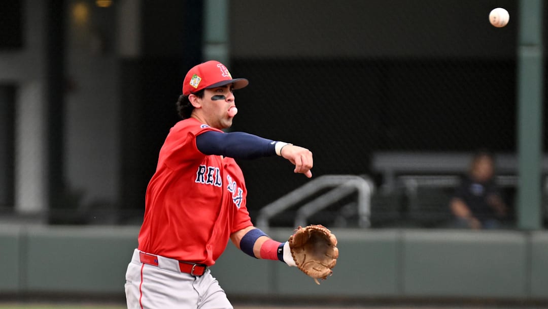 Feb 27, 2026; North Port, Florida, USA; Boston Red Sox second baseman Marcelo Mayer (11) throws to first base in the second inning against the Atlanta Braves during spring training at CoolToday Park. Mandatory Credit: Jonathan Dyer-Imagn Images