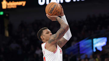 Dec 1, 2025; Salt Lake City, Utah, USA;  Houston Rockets forward Jabari Smith Jr. (10) shoots an open jump shot during the second half against the Utah Jazz at Delta Center. Mandatory Credit: Chris Nicoll-Imagn Images