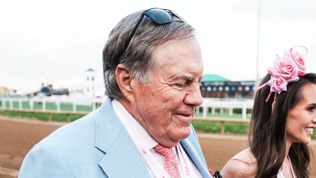 Bill Belichick and girlfriend Jordon Hudson on the dirt track before the 2026 Kentucky Oaks race at Churchill Downs on Friday, May 1, 2026