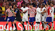Jugadores del Atlético de Madrid y Real Madrid 