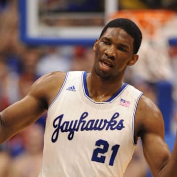 Feb 22, 2014; Lawrence, KS, USA; Kansas Jayhawks center Joel Embiid (21) celebrates after scoring in the first half against the Texas Longhorns at Allen Fieldhouse. Mandatory Credit: Denny Medley-Imagn Images