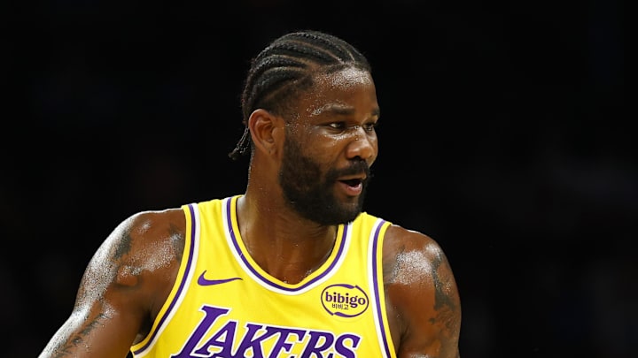 Feb 26, 2026; Phoenix, Arizona, USA; Los Angeles Lakers center Deandre Ayton (5) talks with guard Marcus Smart (36) against the Phoenix Suns at Mortgage Matchup Center. Mandatory Credit: Mark J. Rebilas-Imagn Images