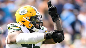 Green Bay Packers defensive tackle Devonte Wyatt (95) celebrates his sack of Tennessee Titans quarterback Will Levis (8) during the second half at Nissan Stadium.