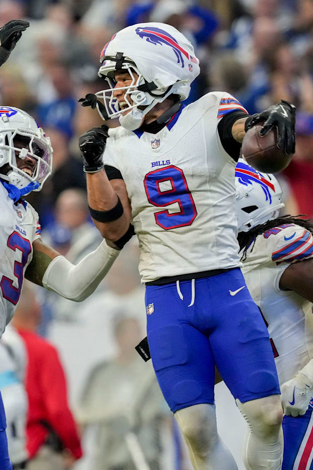 Buffalo Bills safety Taylor Rapp celebrates after making an interception during a game against the Indianapolis Colt