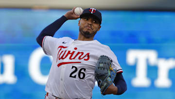 Aug 30, 2025; Minneapolis, Minnesota, USA; Minnesota Twins starting pitcher Taj Bradley (26) throws to the San Diego Padres in the first inning at Target Field. Mandatory Credit: Bruce Kluckhohn-Imagn Images