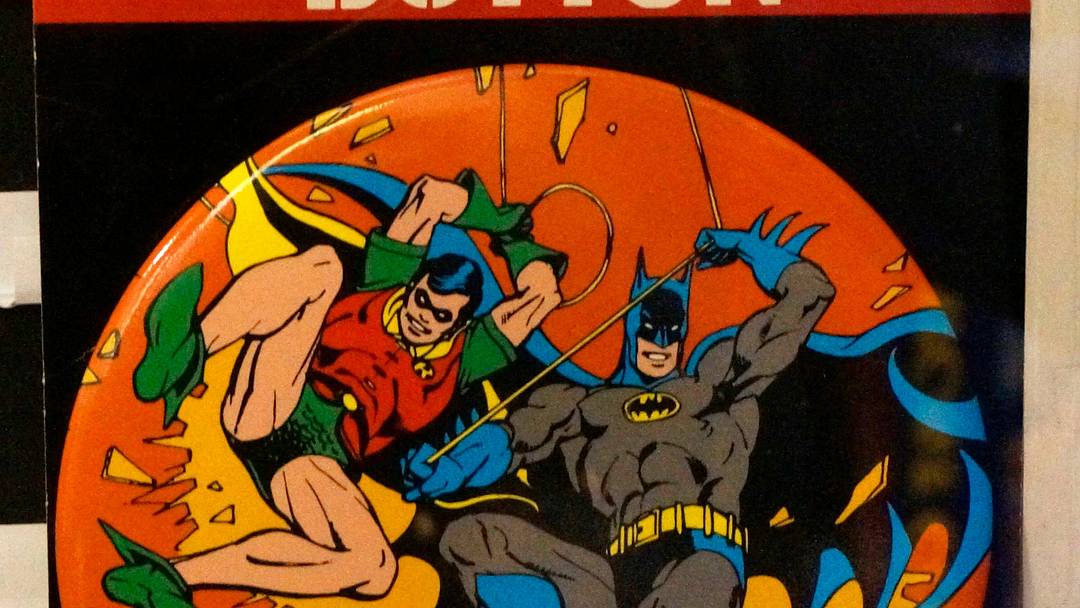 A 1960s Batman inspired button at Freaktoyz as seen, Thursday, March 19, 2026, in Sheboygan, Wis. The firm is celebrating 15 years of business in downtown Sheboygan.