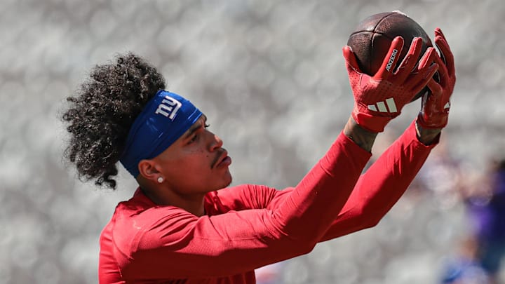 Sep 8, 2024; East Rutherford, New Jersey, USA; New York Giants wide receiver Jalin Hyatt (13) warms up before the game against the Minnesota Vikings at MetLife Stadium.  