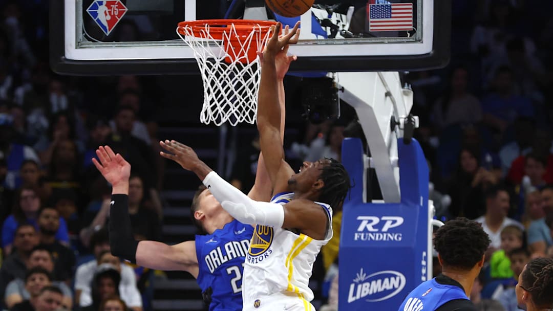 Mar 22, 2022; Orlando, Florida, USA;  Orlando Magic forward Franz Wagner (22) defends Golden State Warriors forward Jonathan Kuminga (00) during the second half at Amway Center. Mandatory Credit: Kim Klement-Imagn Images