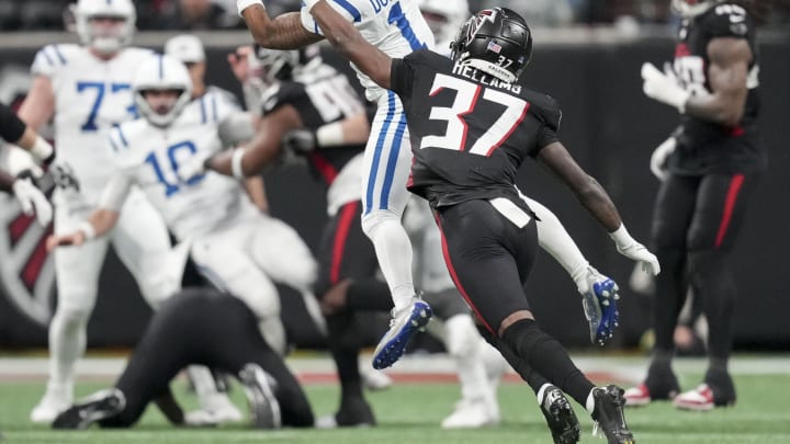 Dec 24, 2023; Atlanta, Georgia, USA; A pass intended for Indianapolis Colts wide receiver Josh Downs (1) goes incomplete as Atlanta Falcons safety DeMarcco Hellams (37) applies pressure during a game at Mercedes-Benz Stadium. Mandatory Credit: Bob Scheer-USA TODAY Sports