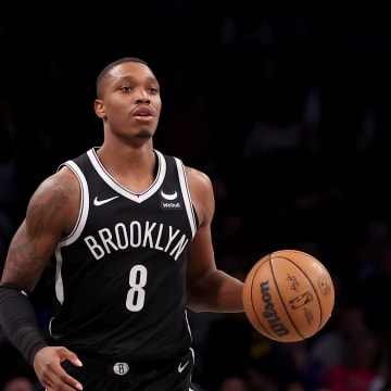 Jan 23, 2024; Brooklyn, New York, USA; Brooklyn Nets guard Lonnie Walker IV (8) brings the ball up court against the New York Knicks during the fourth quarter at Barclays Center. Mandatory Credit: Brad Penner-USA TODAY Sports