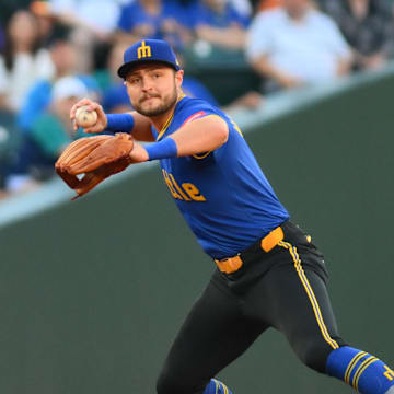 Seattle Mariners third baseman Ben Williamson (9) throws to first base for a force out on Kansas City Royals left fielder Nick Loftin (12) (not pictured) during the second inning at T-Mobile Park on July 3. 