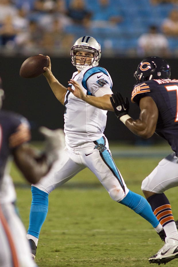 Carolina Panthers quarterback Jimmy Clausen throws the ball during the second half against the against the Chicago Bears Carolina Panthers quarterback Jimmy Clausen throws the ball during the second half against the against the Chicago Bears