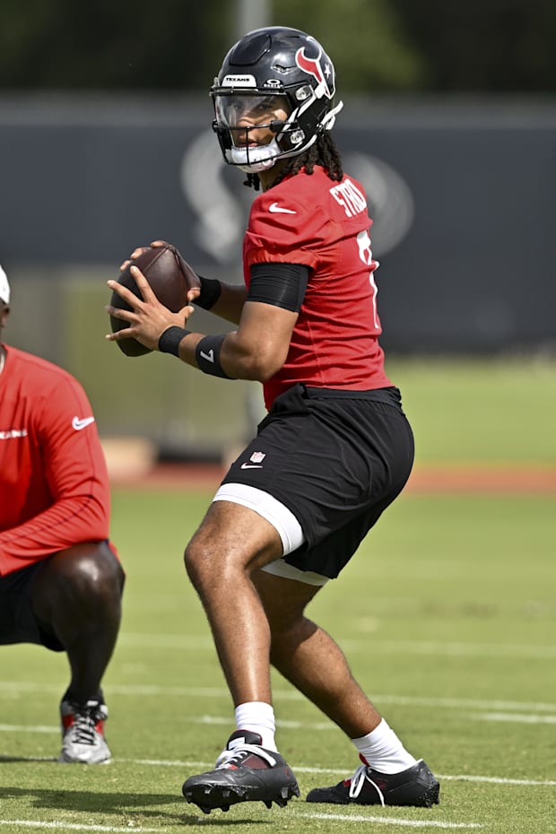 Houston Texans quarterback C.J. Stroud participates in a drill during an NFL football minicamp at NRG Stadium